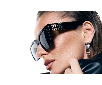 Miu Miu VMU 04U 1AB Black Sunglasses