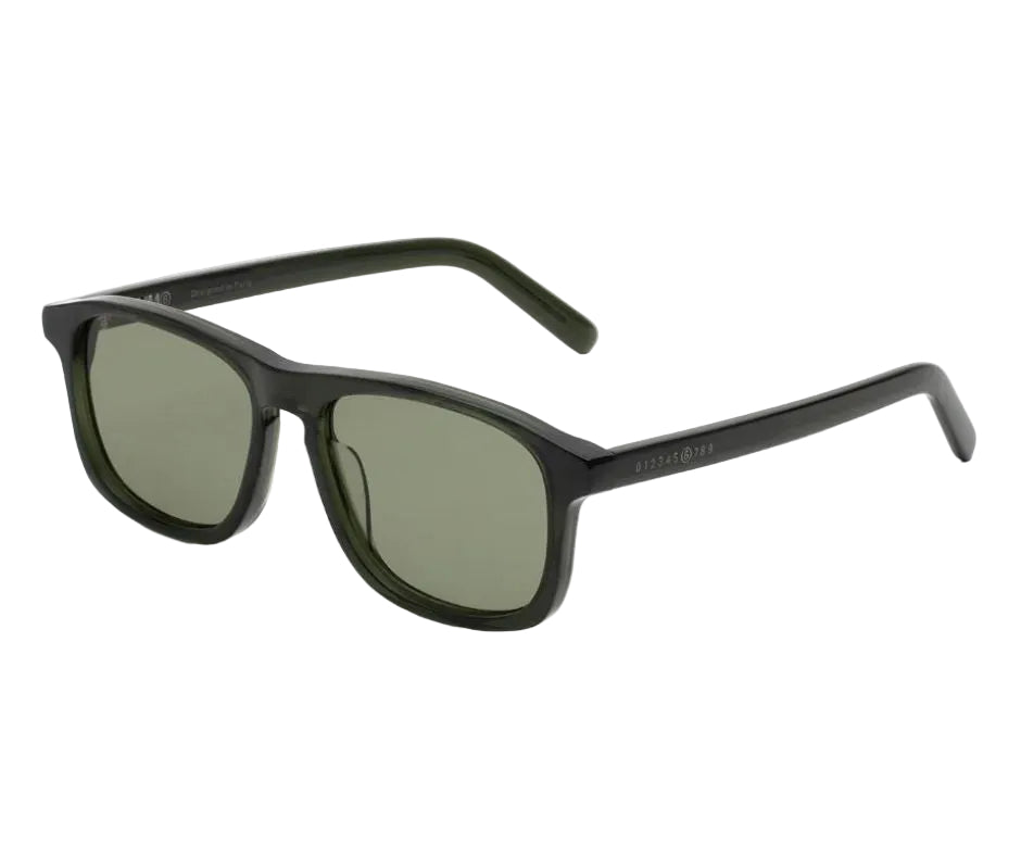 Black sunglasses with green lenses on a white background