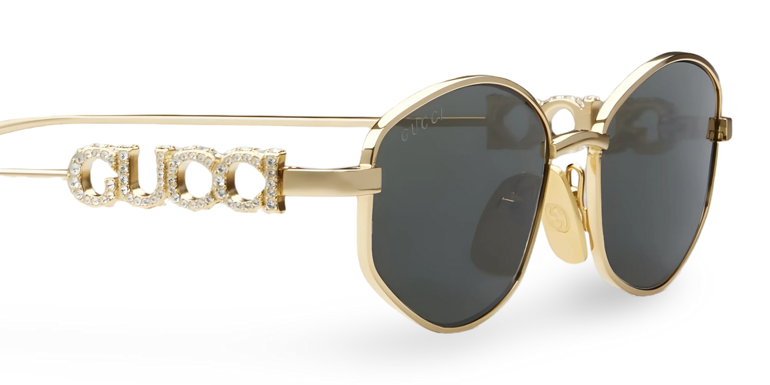 Gucci GG1802S 001 Round Sunglasses Gold / Grey Lens Crystal Logo Temple